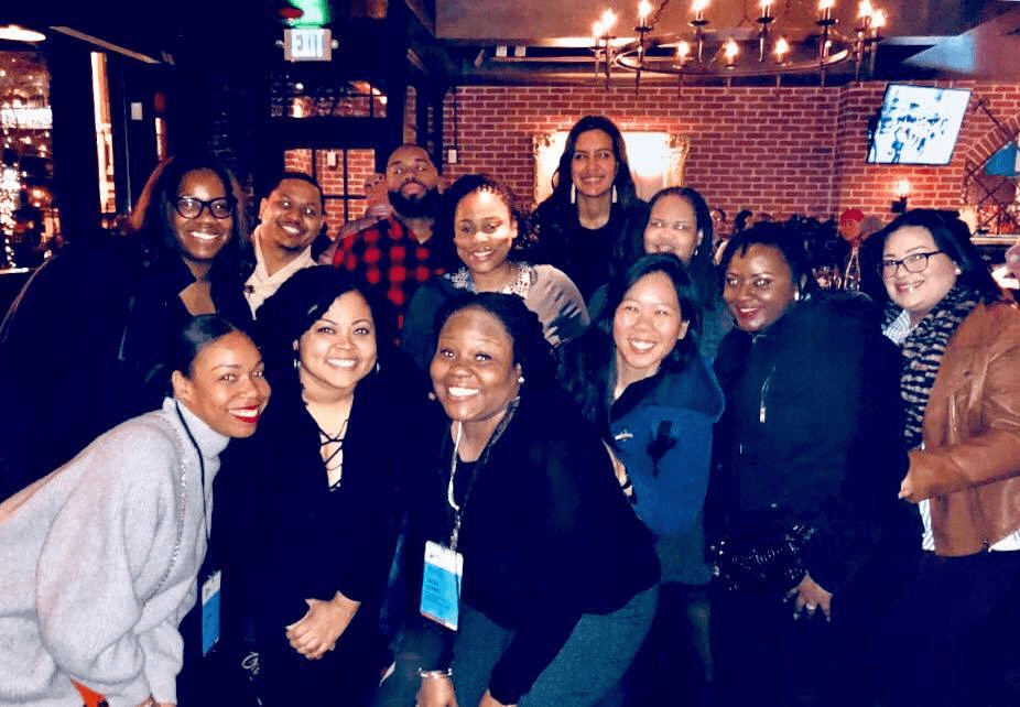 Photo shows Jennifer Reid Davis with educators at Teach for America's School Leaders of Color Conference in 2018