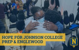 Image shows a mother and her student at Johnson College Prep hugging after the Hope Chicago announcement that they could go to college for free. On top of the image, there are blue words on a yellow background that read "Hope for Johnson College Prep and Englewood". The Noble Schools logo is in the bottom right corner.