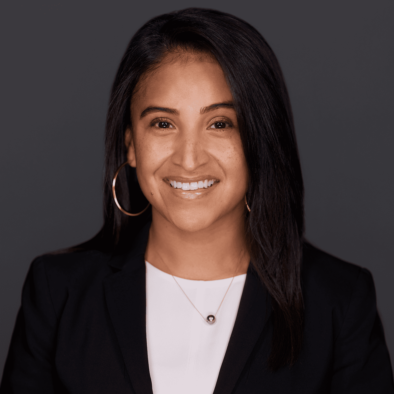 Image is a headshot of Norma Gutierrez Castro, the Assistant Director of Student Experience at Noble Schools and the founder of the Black Boys Collaborative at Noble Schools