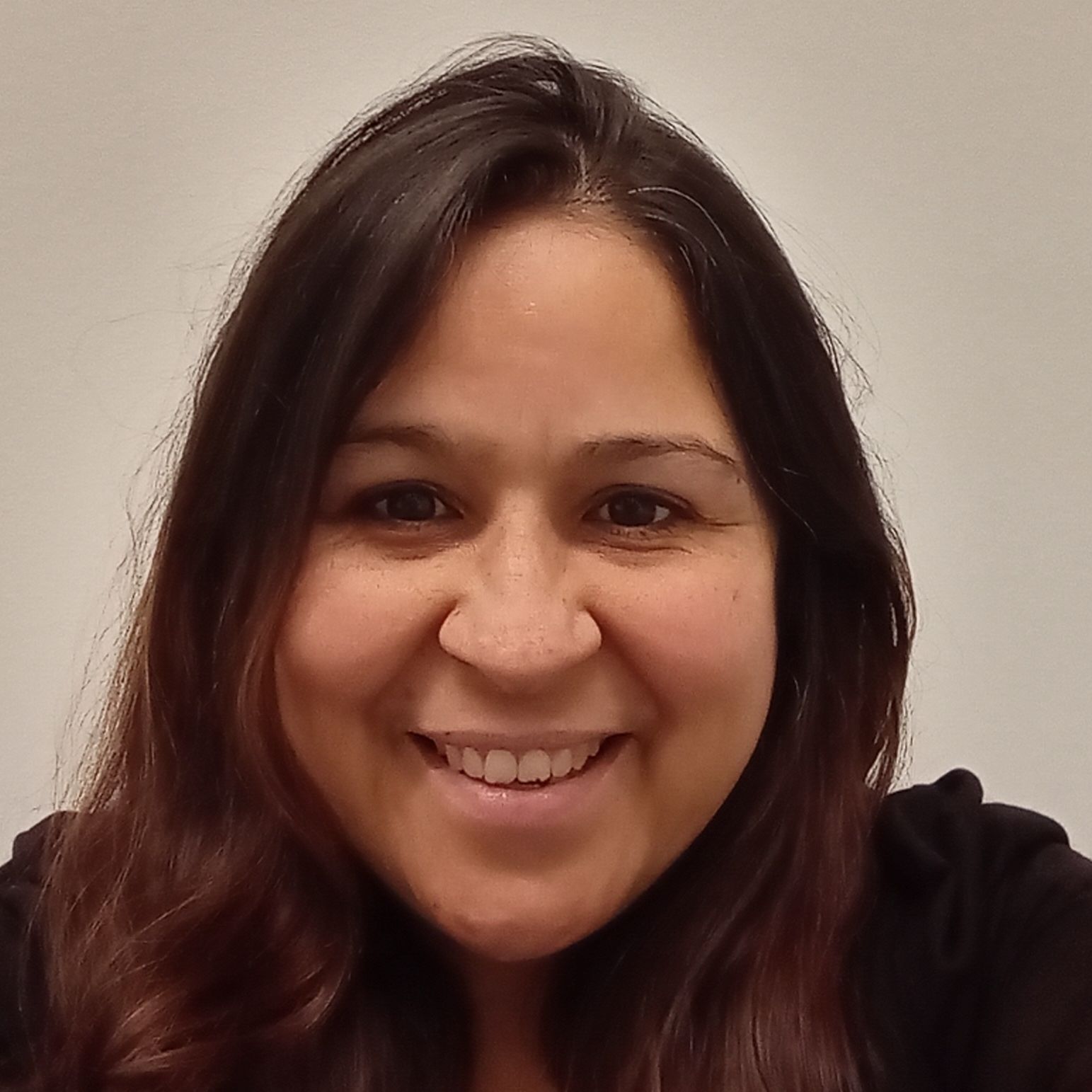 Image shows a headshot of Yesenia Maldonado, the Assistant Director for Social-Emotional Learning and Support at Noble Schools in Chicago, IL. She is wearing a black shirt and smiling.