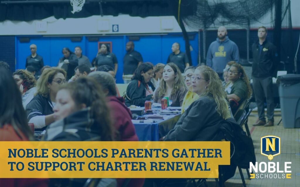 In this graphic, there is a background photo that shows Noble Schools parents sitting at tables in a gym, looking toward speakers that are not pictured. On top of that image is a dark blue transparent box. In the bottom left corner is a yellow box with dark blue text on it that reads "Noble Schools Parents Gather to Support Charter Renewal". In the bottom right corner is the Noble Schools logo.