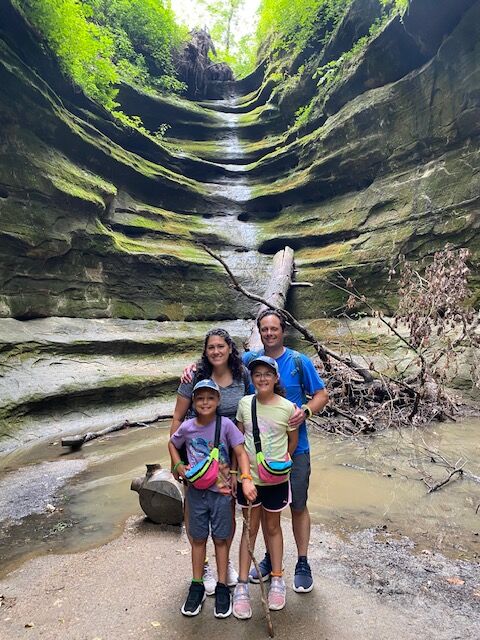 Carrie Spitz with her family at a carved rock park