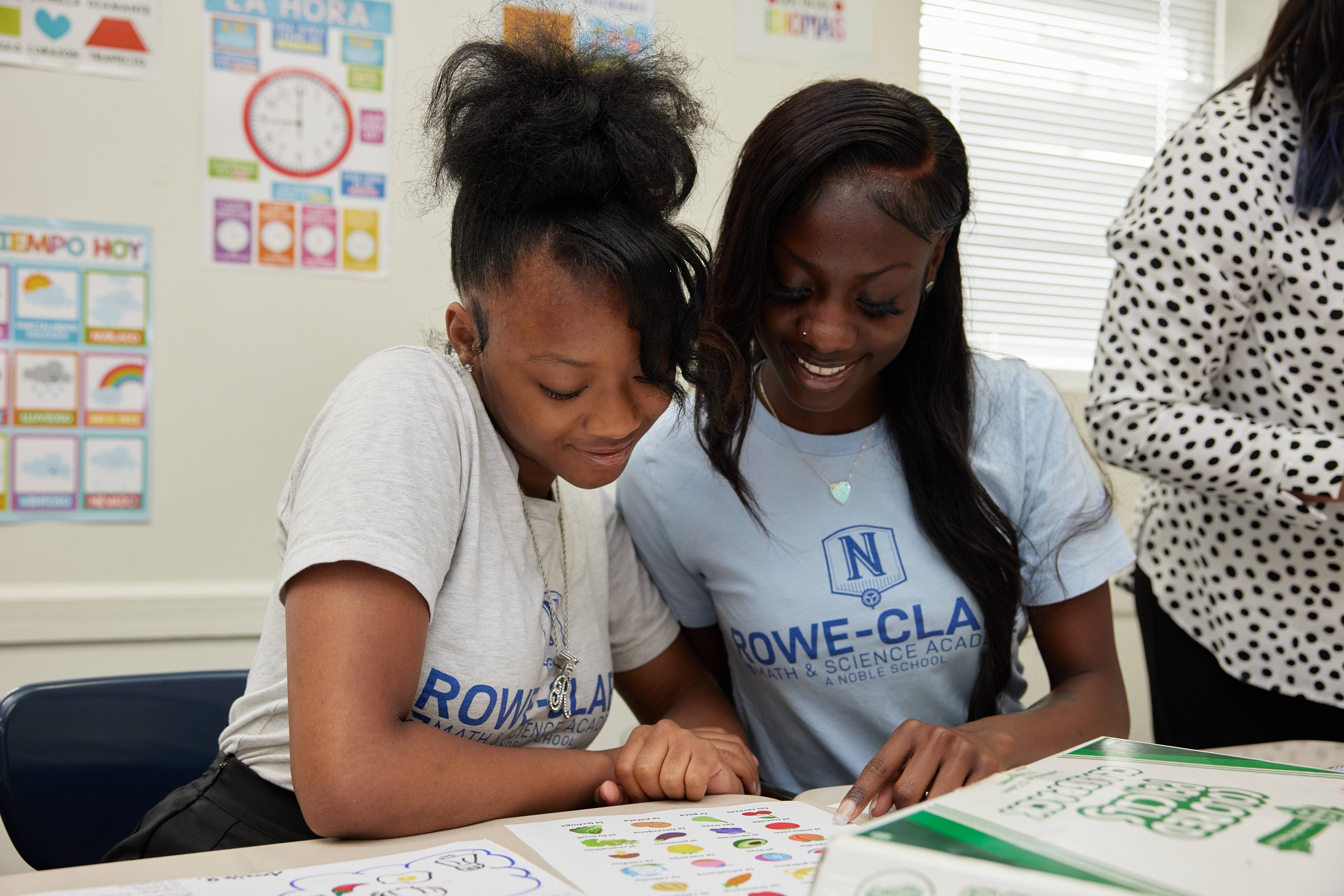 Image shows two students at Rowe-Clark Math & Science Academy working on an exercise in Spanish class.