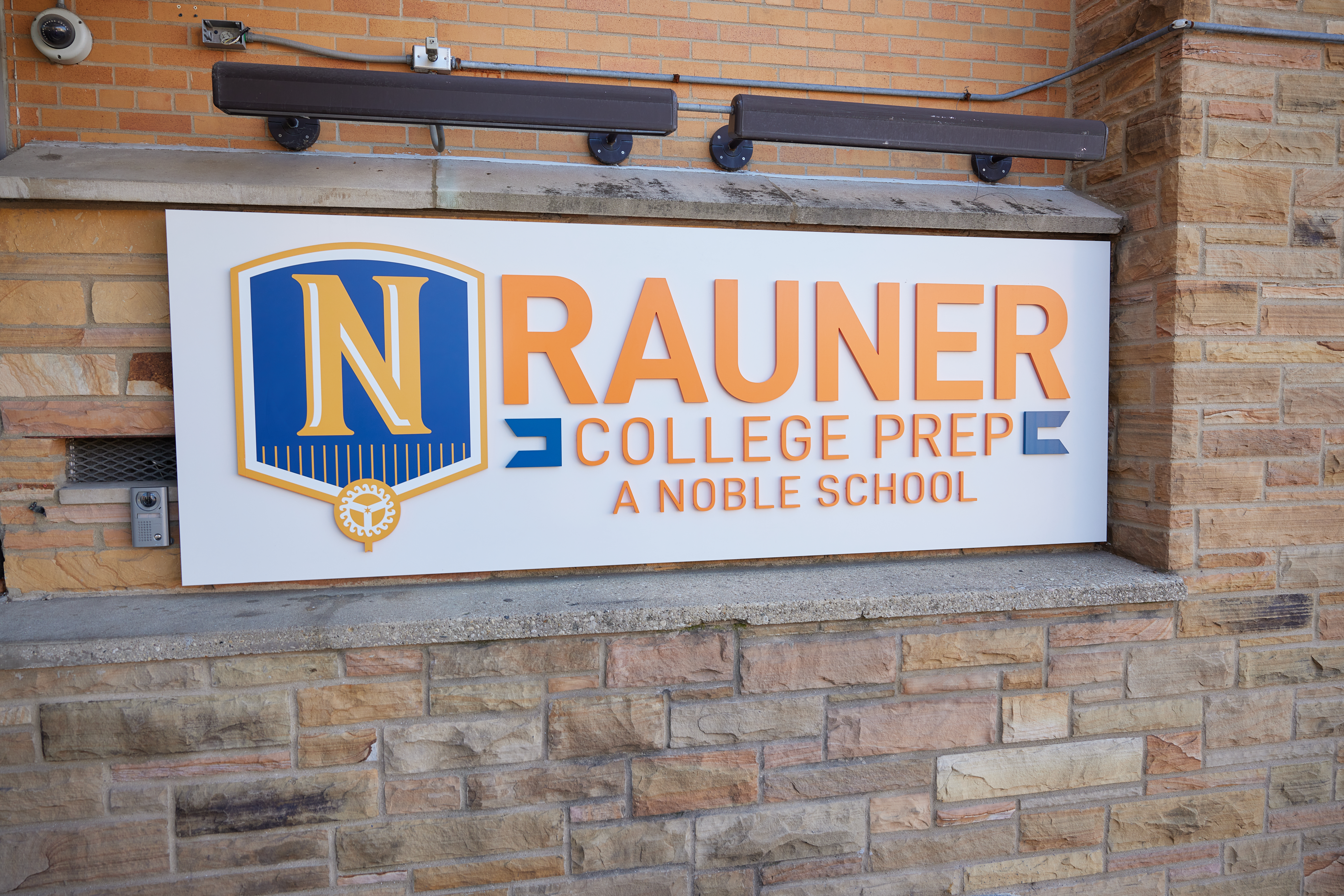 sign that reads "RAUNER COLLEGE PREP"