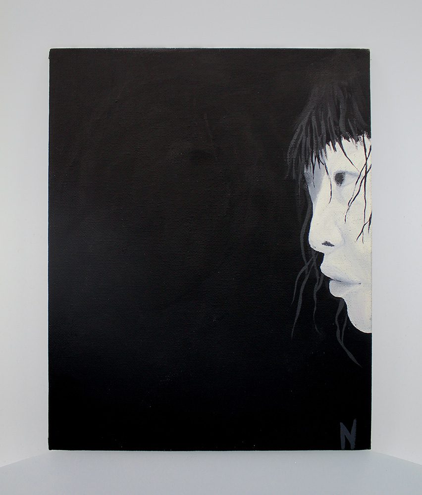 This painting is mostly black, with a partial view of a woman's face on the right edge. She's facing sideways, so you can't see her whole face. She has bangs.