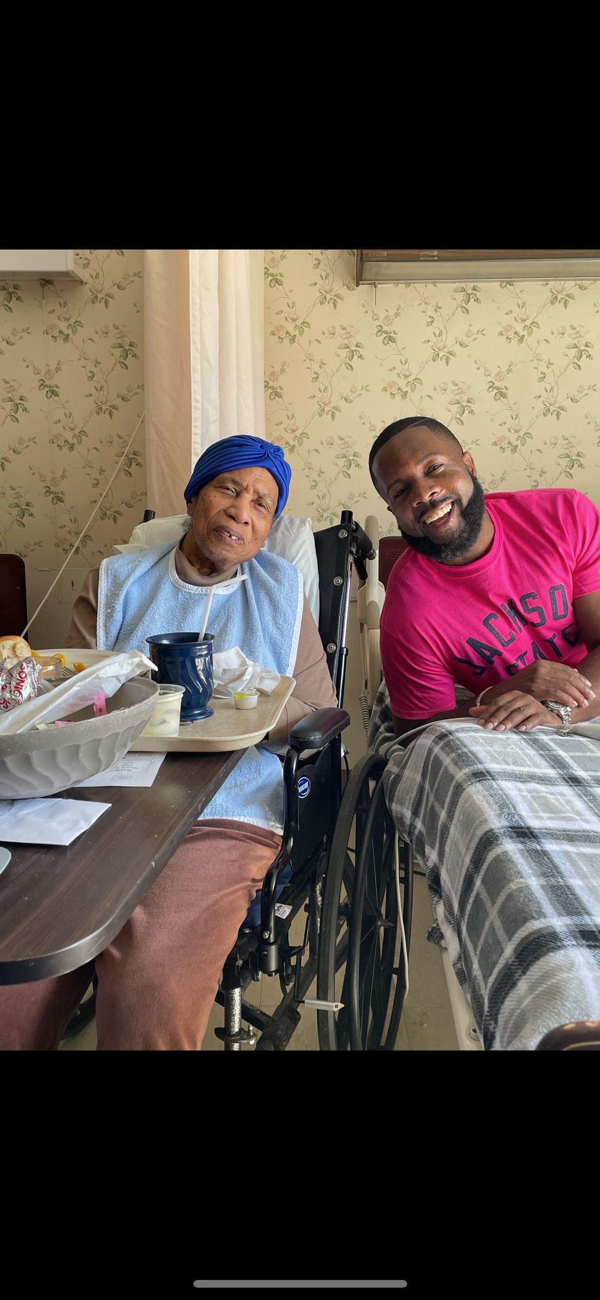 Riddick spending time with her grandmother in a hospital or nursing home.