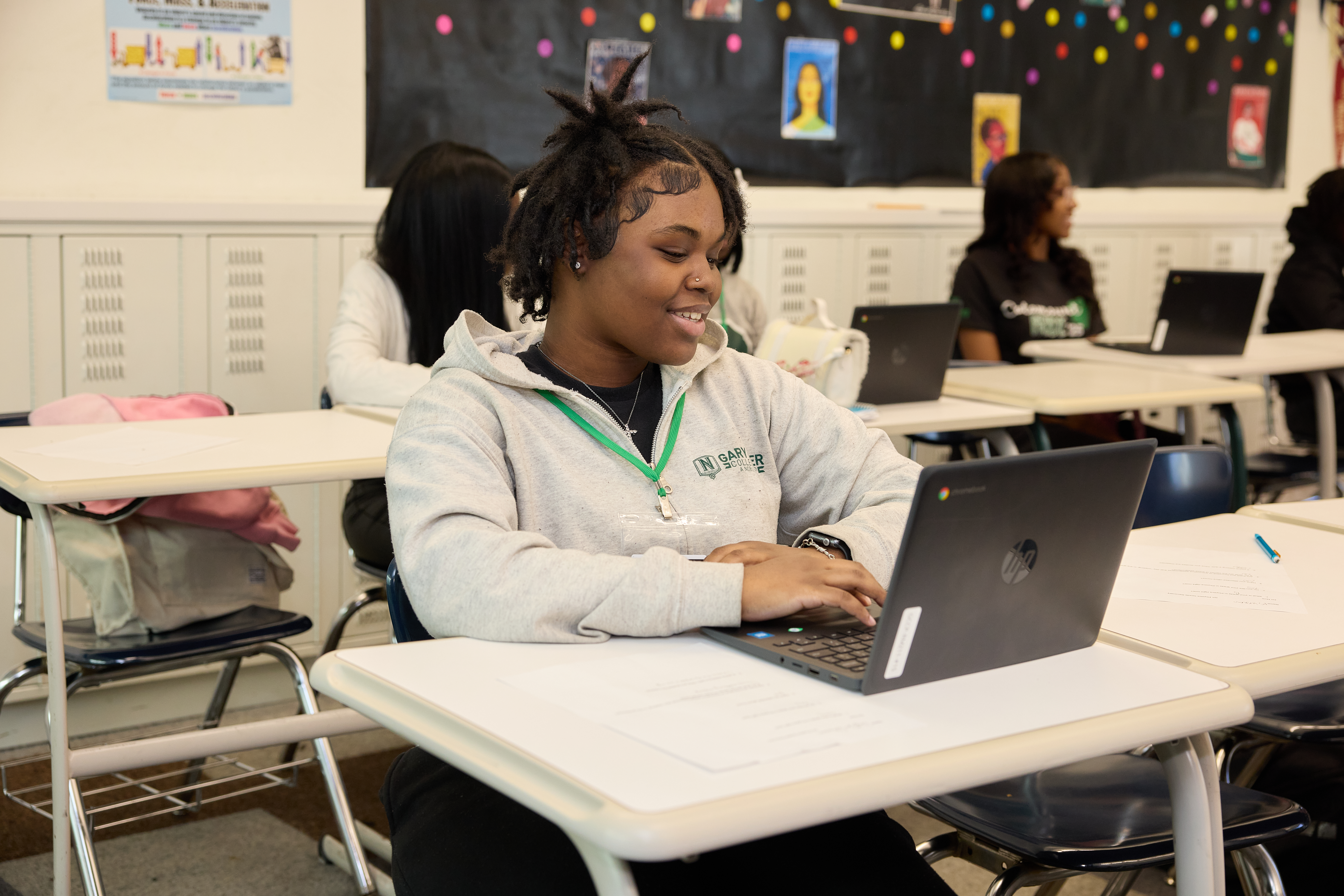 happy student with laptop