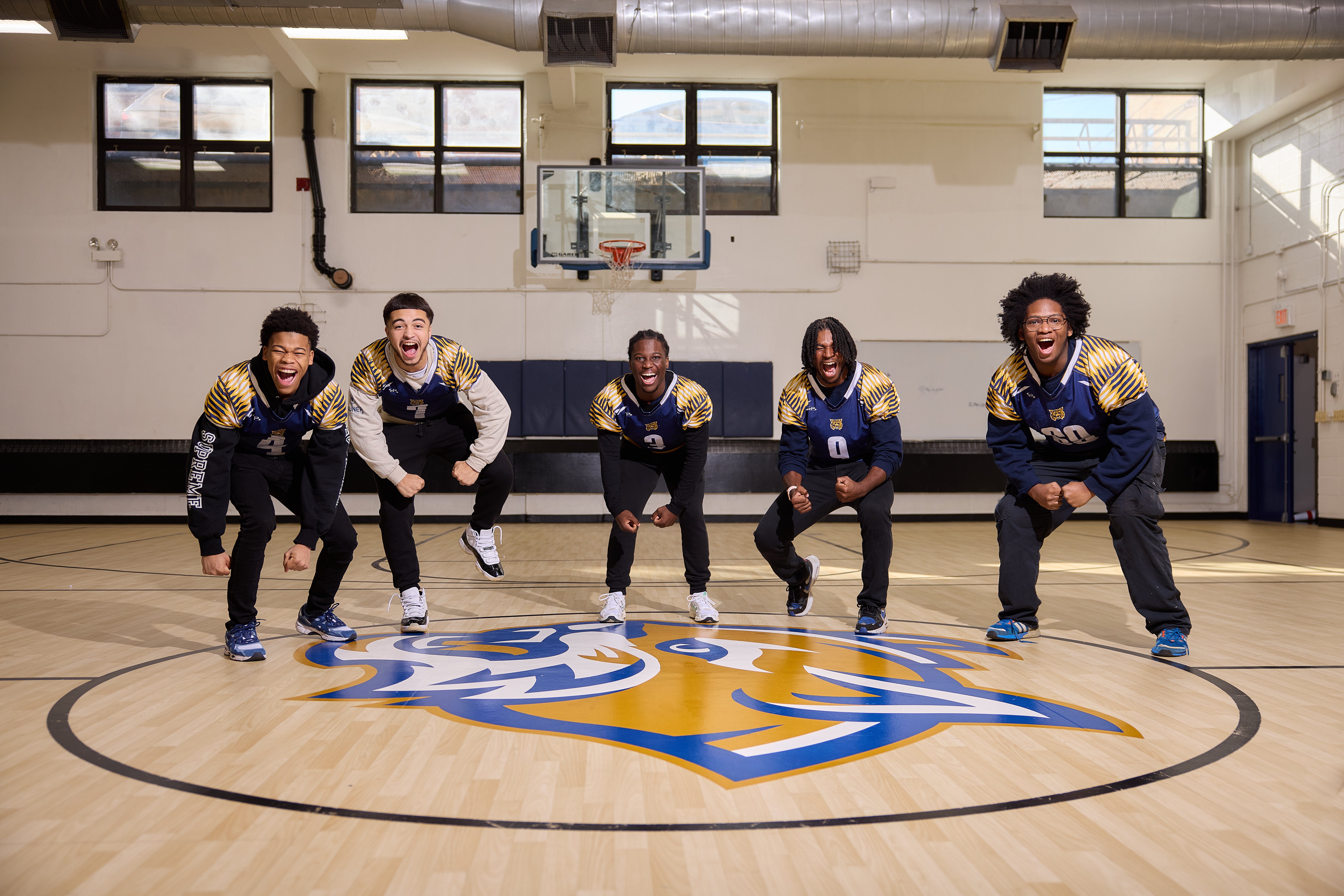 Student athletes smiling at Rauner College Prep Charter High School in Chicago