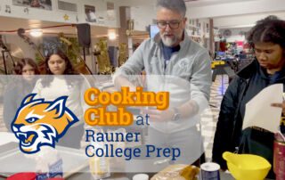 Robert Vega in Cooking Club is discussing a recipe with students at Rauner College Prep.