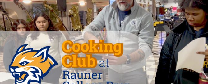 Robert Vega in Cooking Club is discussing a recipe with students at Rauner College Prep.