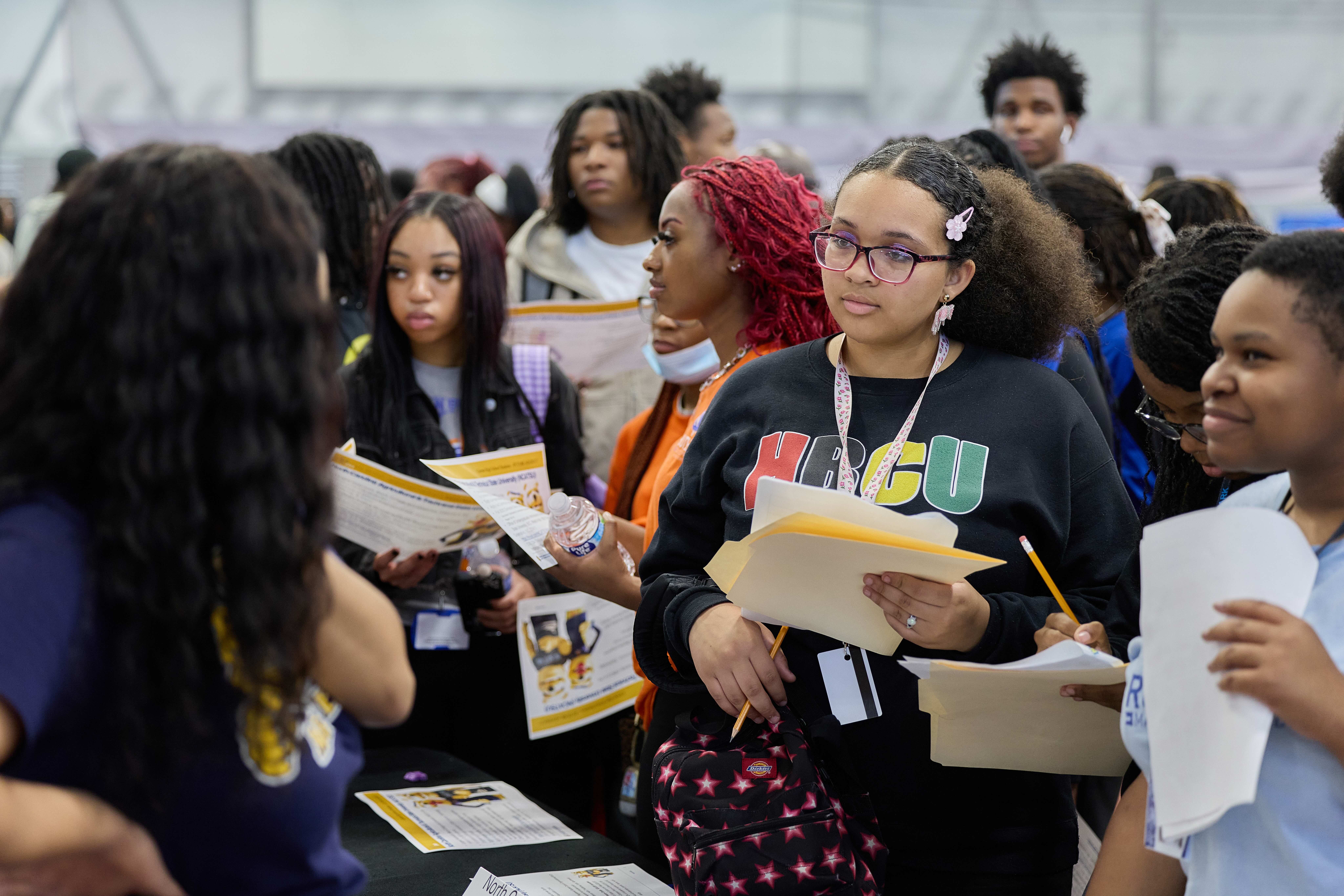 Group of students at a college booth at the HBCU College Fair