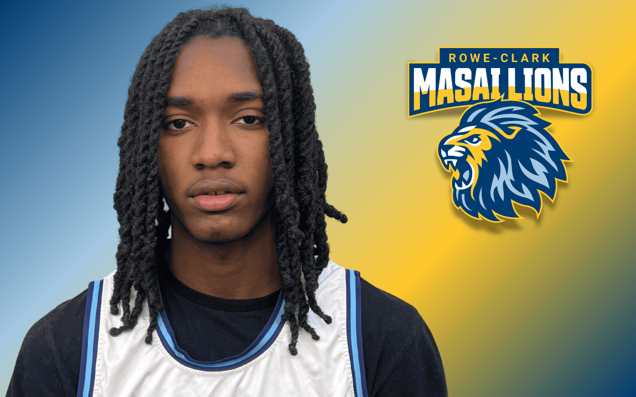 A headshot of Quincy Stone, a young Black man with shoulder-length locs and a white and blue basketball jersey. Above his right shoulder is the Masai Lions mascot for Rowe-Clark Math and Science Academy in Chicago, IL.