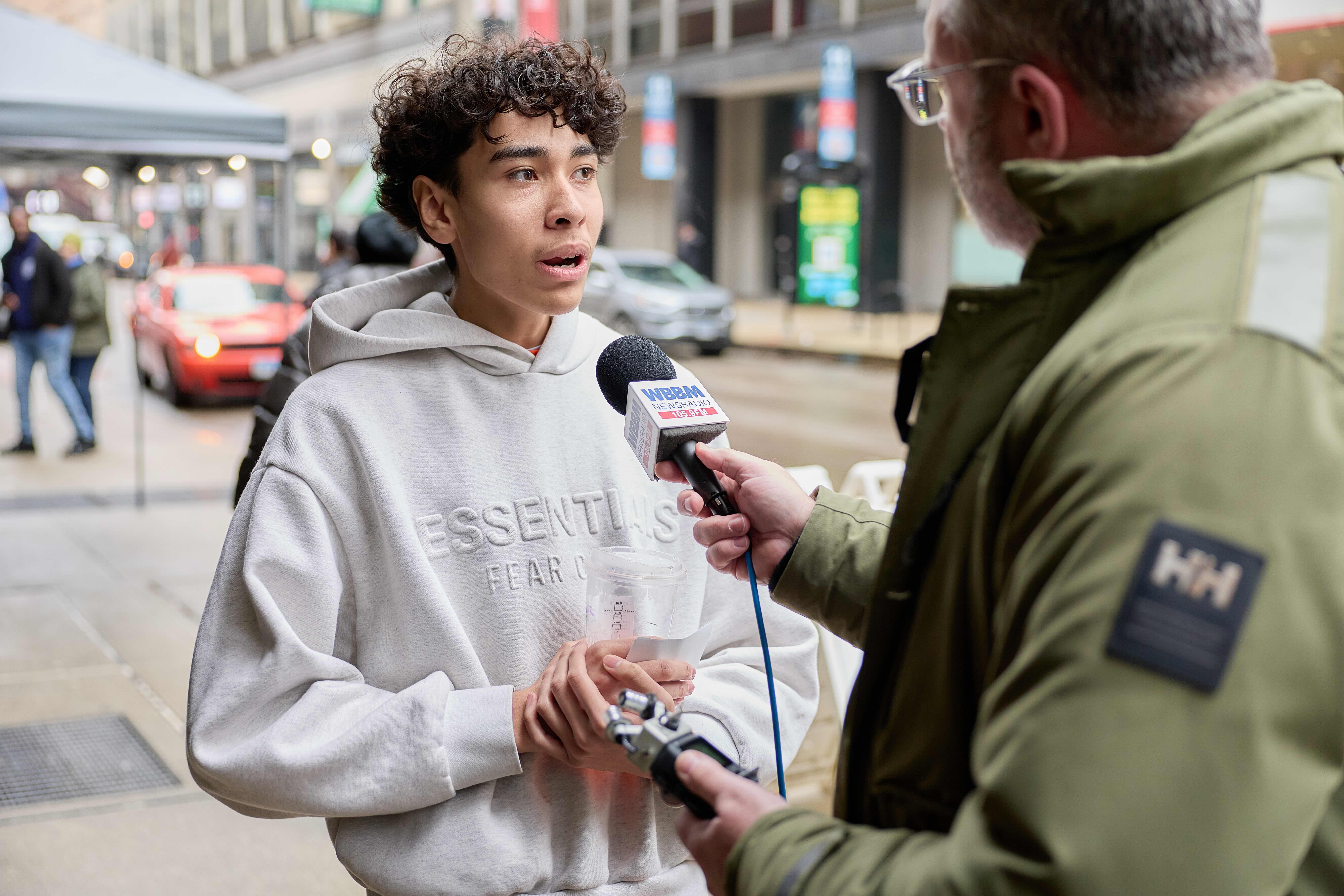A Noble student is being interviewed by a WBBM News reporter